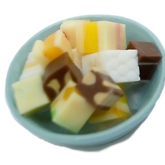 Image of Cubes of Turron on Blue Plate 